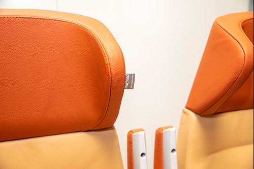 Orange and beige rail leather seats